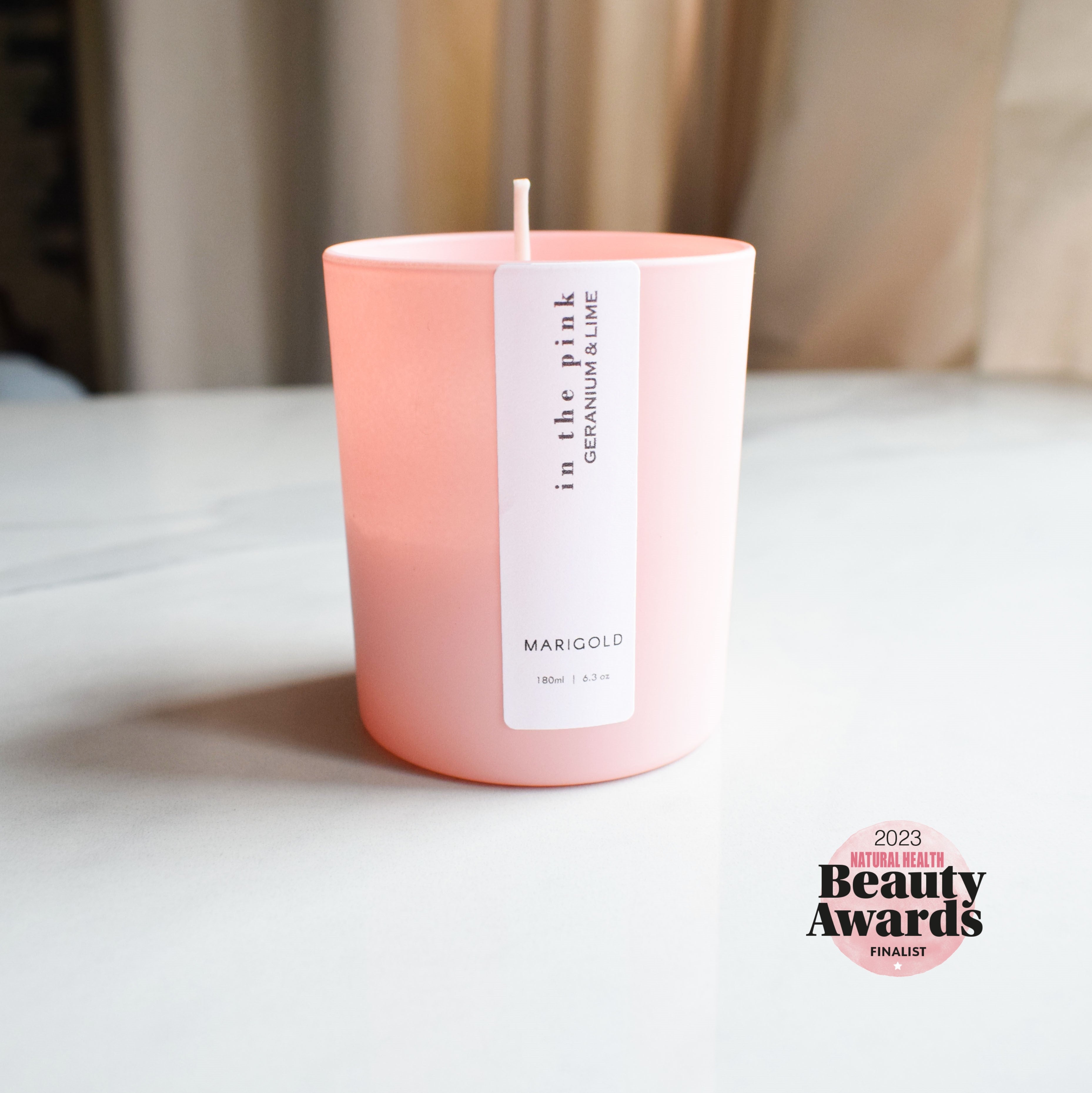 Marigold Charms In the Pink candela aromatica rosa 180 ml