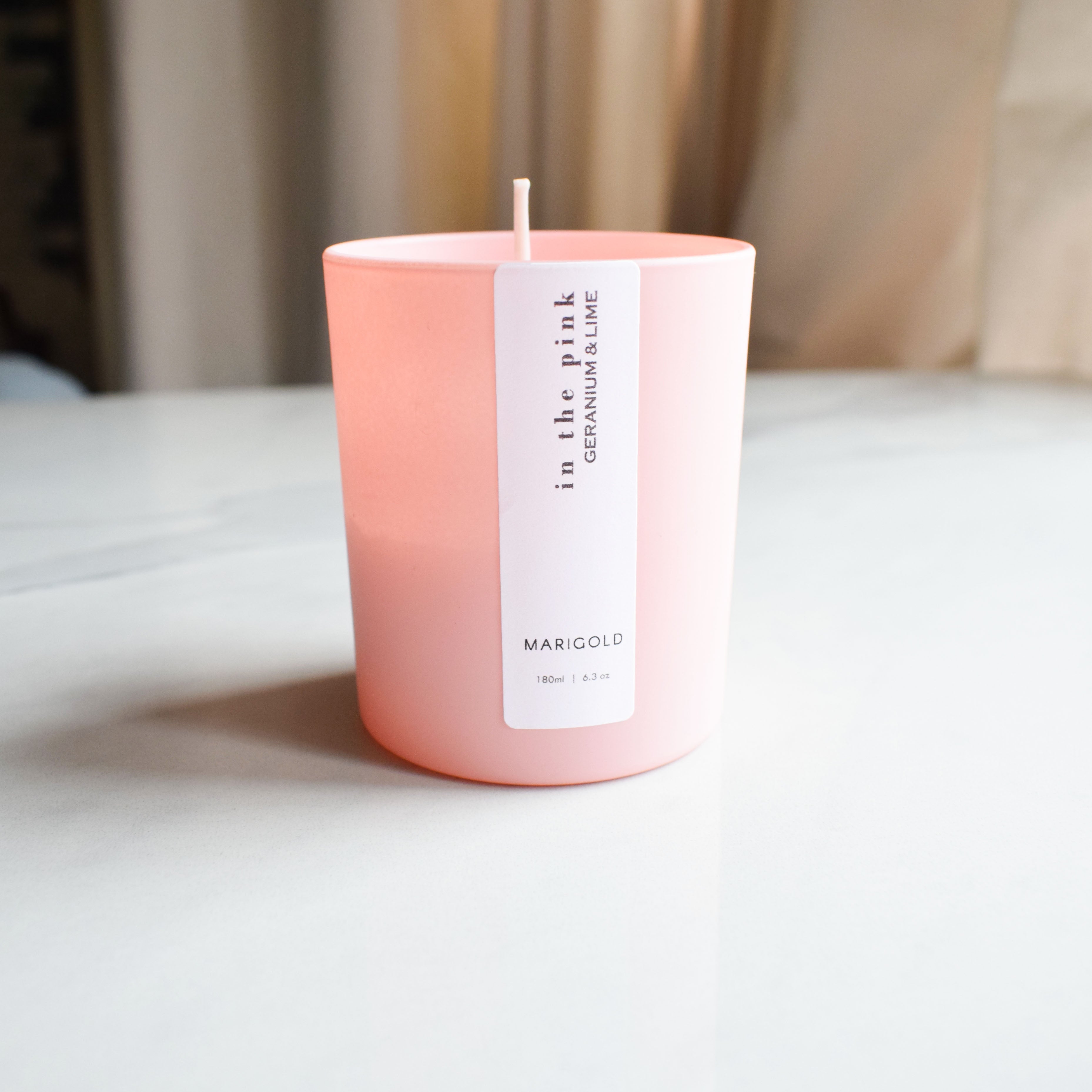 Marigold Charms In the Pink candela aromatica rosa 180 ml
