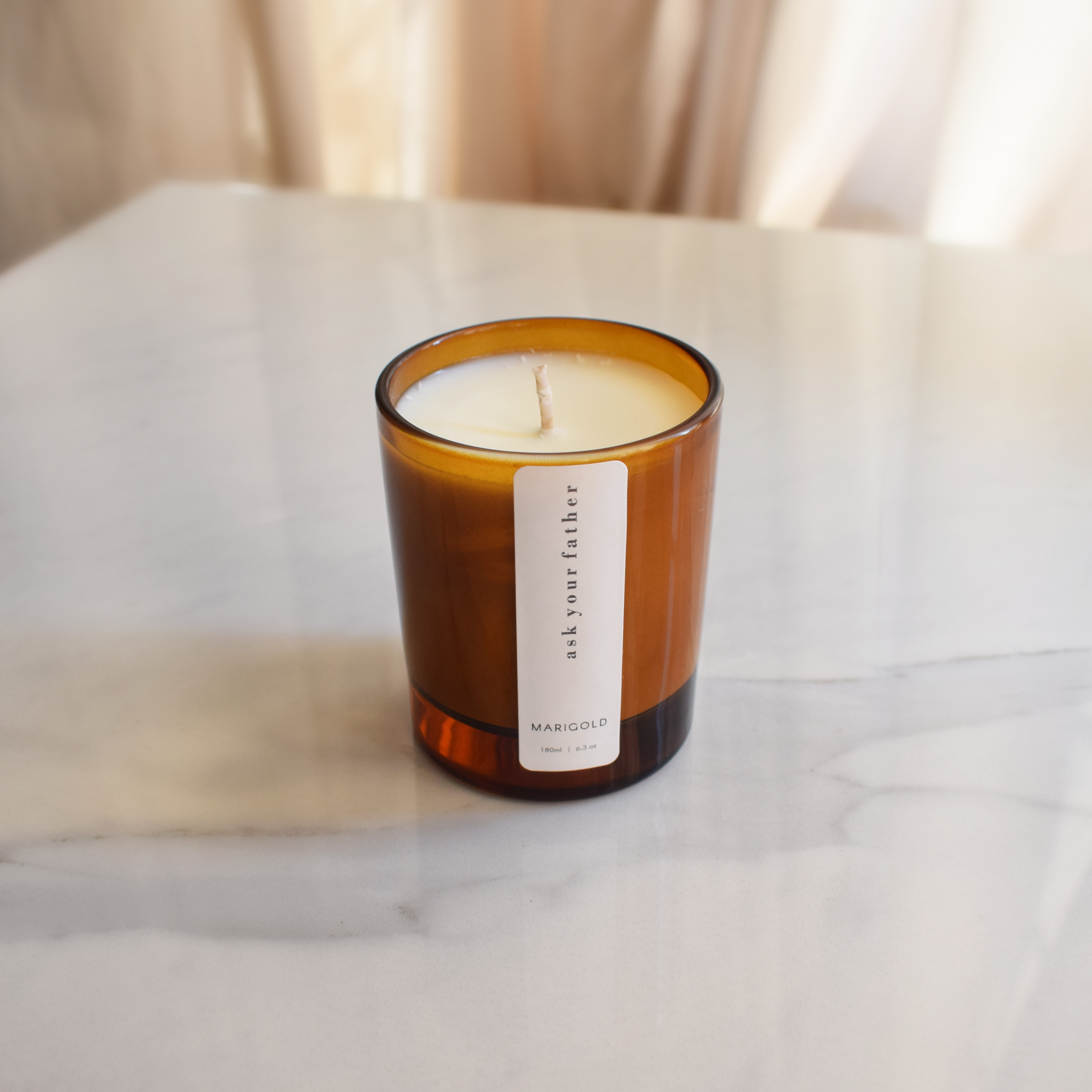 Marigold Charms Ask Your Father candela profumata sandalo 200 ml