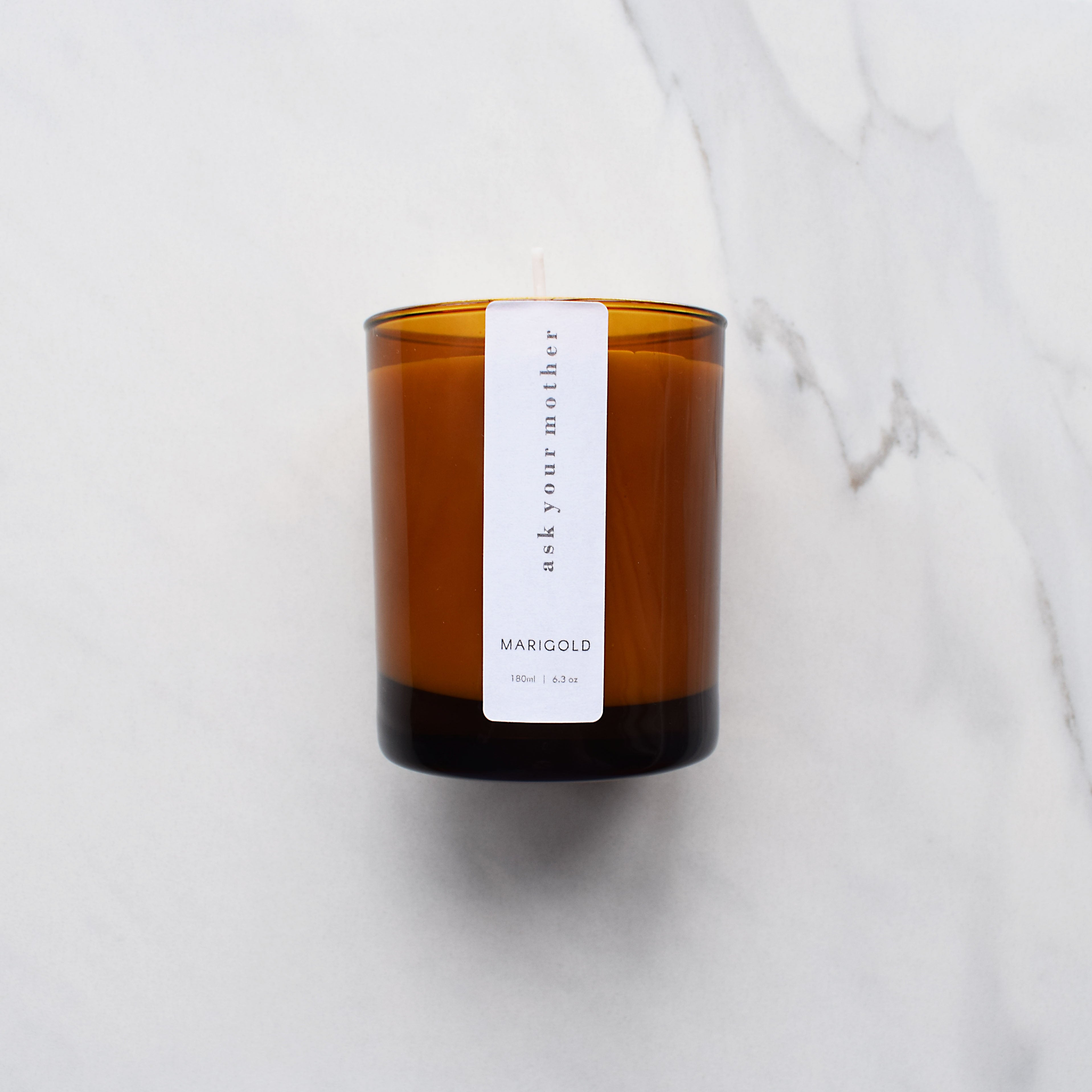 Marigold Charms Ask Your Mother candela profumata 200ml sandalo bergamotto