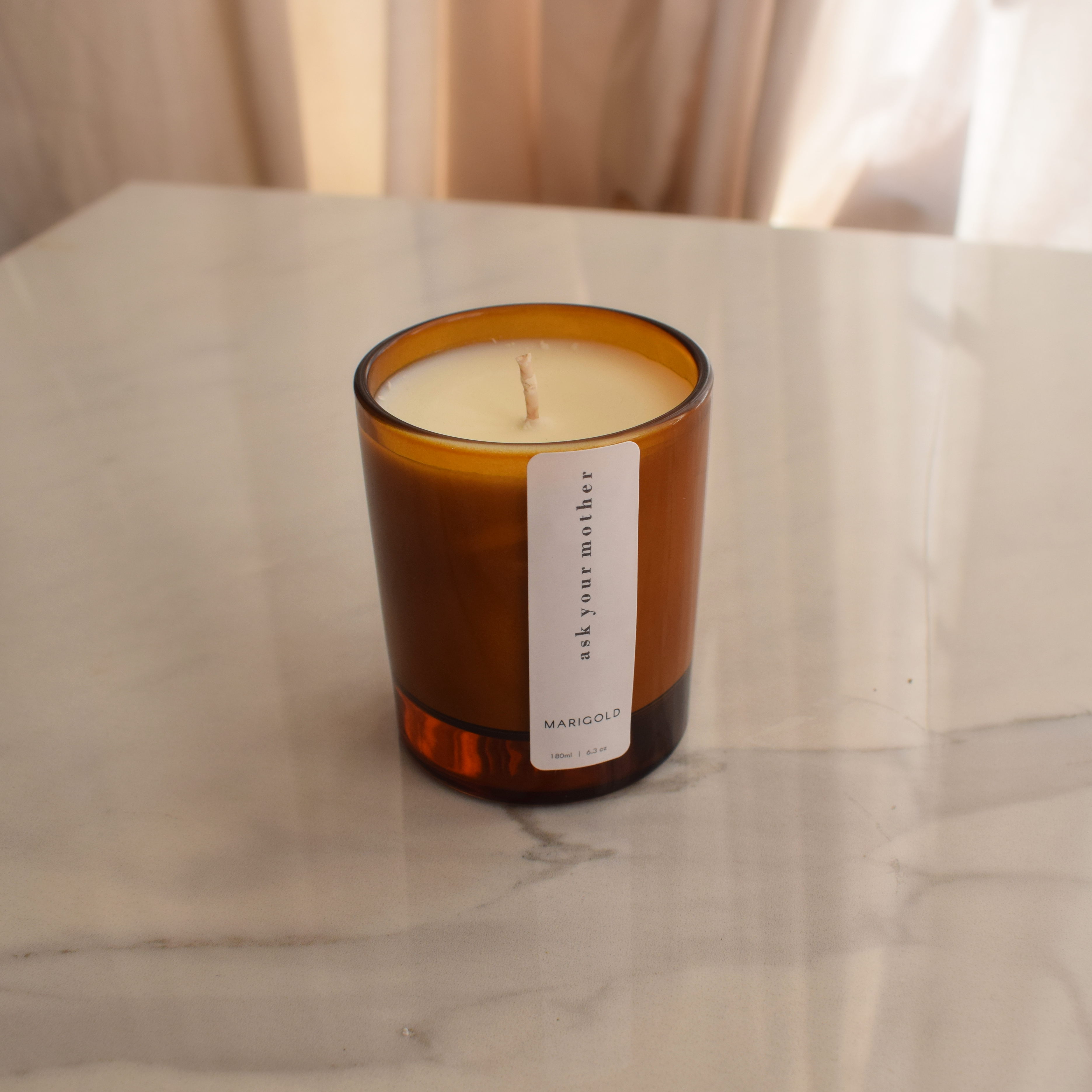 Marigold Charms Ask Your Mother candela profumata 200ml sandalo bergamotto