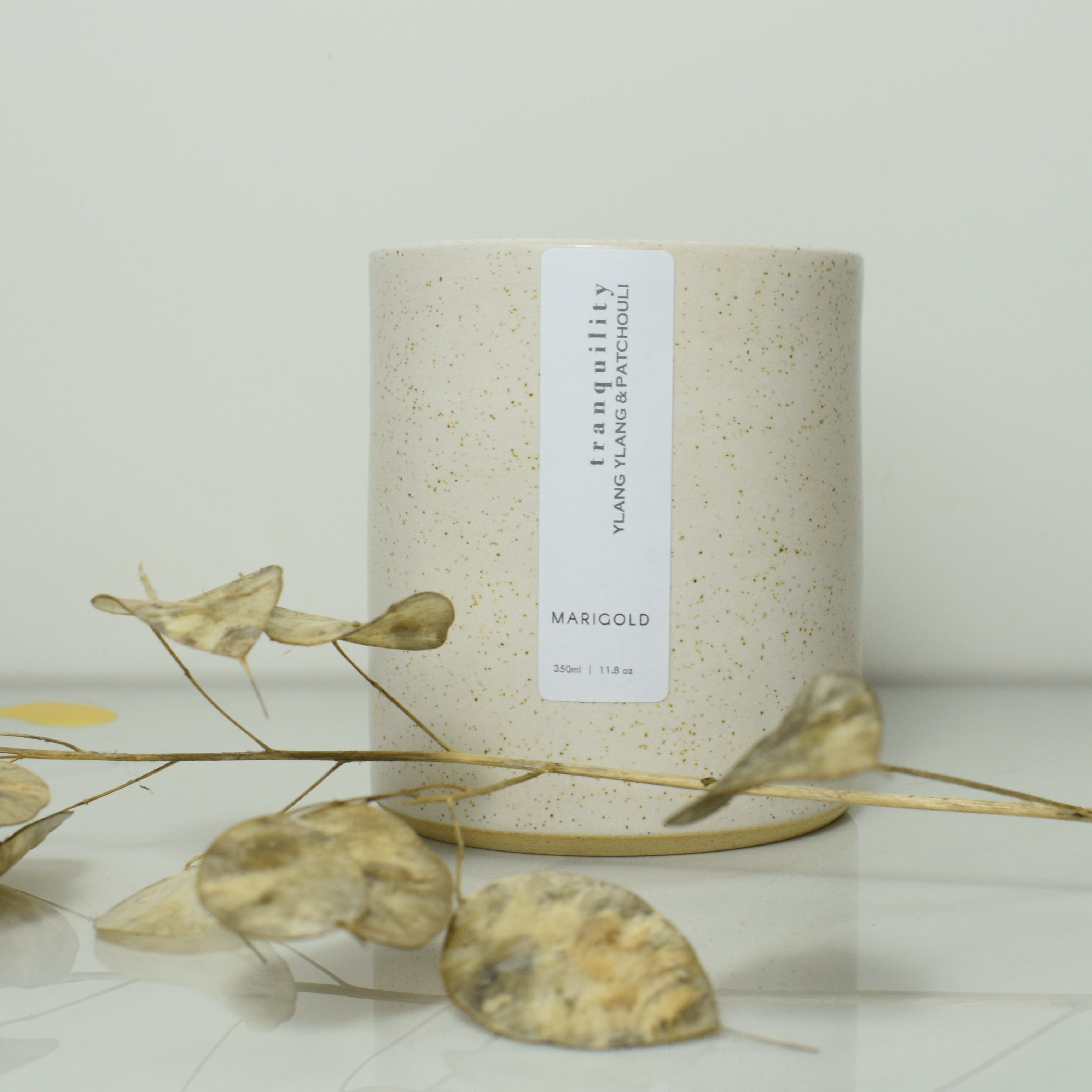 Marigold Charms Tranquility candela ylang ylang e patchouli ricaricabile