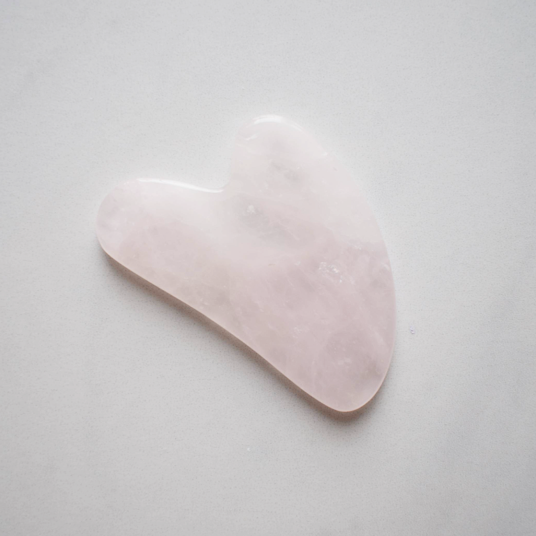 Marigold Charms pietra gua sha quarzo rosa viso levigante